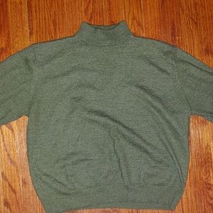 Boys green sweater.